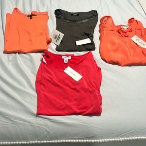 4 size large woman's brand new blouses/shirts